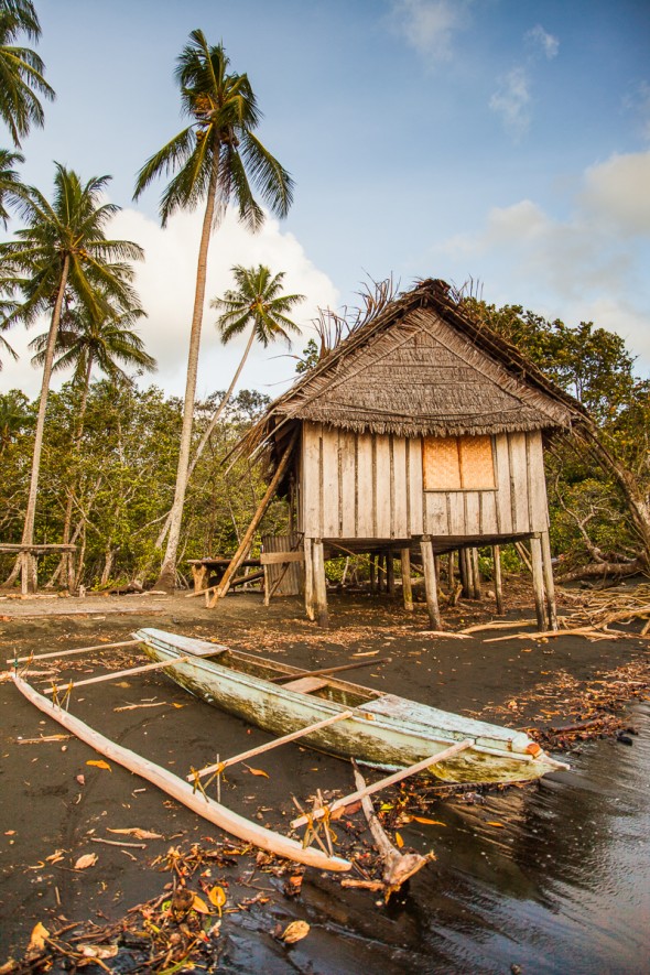 Hut and Fishing Canoe in PNG