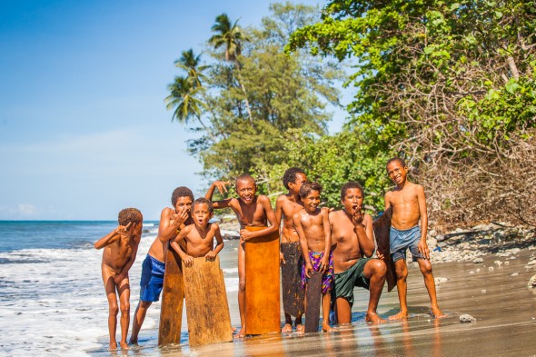 Surfing Boys in Papua New Guinea